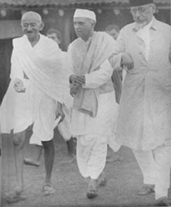 Gandhi, Nehru and Azad checking the time, Wardha, August 1935