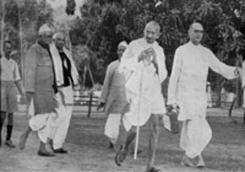 Gandhi with Mahadevbhai on the way to khadi exhibition, Lucknow,  1936