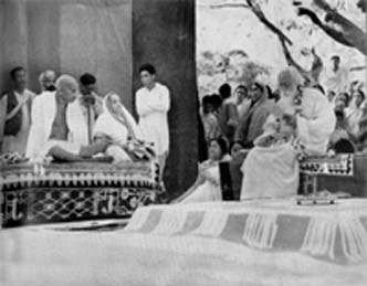 Tagore delivering the address of welcome to Gandhi and Kasturbai, Arma Kunj, Shantiniketan, February 18, 1940 (Gandhi later saw drama 'Chandika')