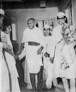 Gandhi with Shantikumar Morarjee visit Kasturba National Memorial Trust's office at Scindhia House, Bombay. April 13, 1945