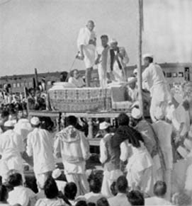 Addressing the eager crowd on a railway platform at Bezwada, February 5, 1946