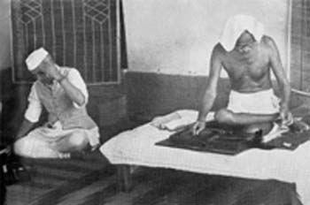 Gandhi and Nehru at the mass spinning during the National Week, Delhi, April 1946